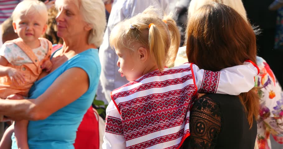 Ukraine, Vinnitsa, City Day, Circa 2015: Ukrainian mother and her little daughter in national costumes
 | Shutterstock HD Video #11646926