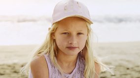 Video portrait of a young girl on the beach
