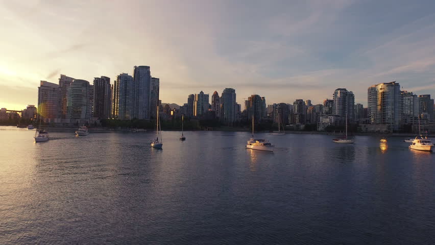 4K forward Aerial drone shot of Vancouver skyline at sunset. Royalty-Free Stock Footage #11672000
