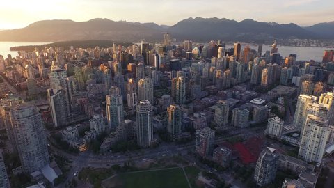 4K Aerial drone shot of Vancouver Skyline at sunset. 