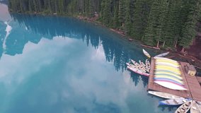 4K Aerial drone shot of Lake Moraine in Banff National Park, Alberta, Canada at sunrise