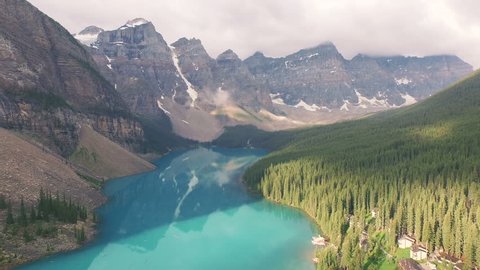 4K Aerial drone shot of Lake Moraine in Banff National Park, Alberta, Canada at sunrise – Stockvideo