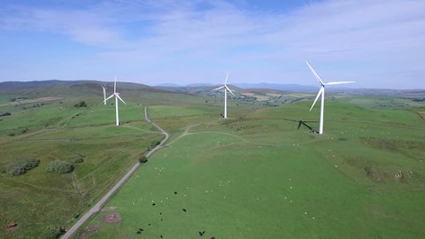 Aerial view of Welsh wind farm generating electricity power for local villages and towns