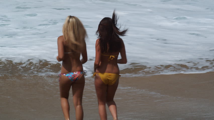 two young women on the beach