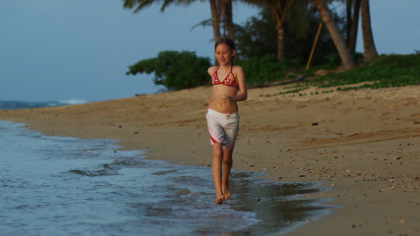 girl running on the beach