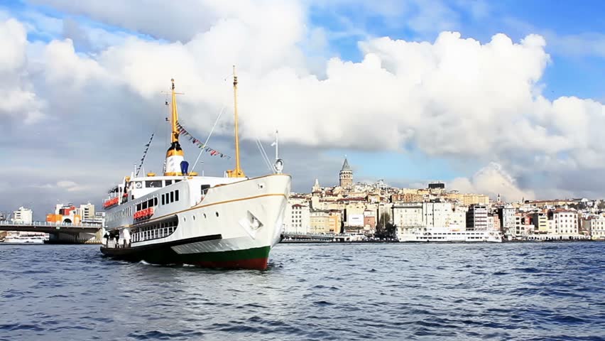 Istanbul ferryboat moves in to port at Eminonu 
