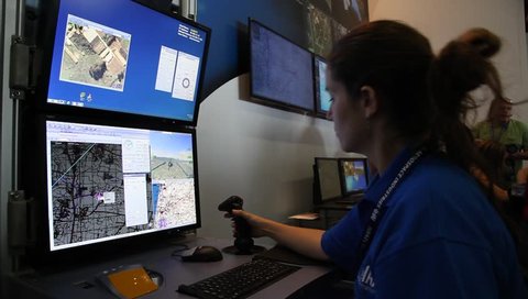 RASHLATZ, ISRAEL - SEPTEMBER 7, 2015: A student uses UMT UAV Mission Trainer flight simulator by IAI Israel Aviation Industries during iHLS AUSR expo and conference.
