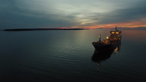 Aerial Shot of Tanker Ship Moving in Sea at Night.