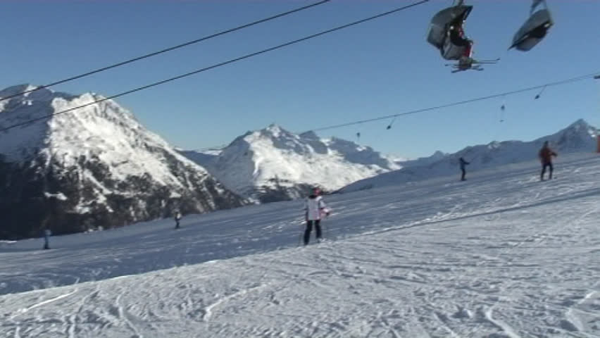 Mounting skiing resort in Austria. People ski.
