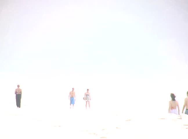 People walking in the beach, high key effects for a futuristic approach. Good background.