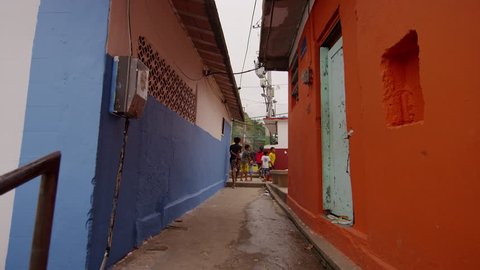 RIO DE JANEIRO - CIRCA JUNE 2013: Slow dolly shot of favela in Rio de Janeiro, Brazil. Some people are shown in the shot.: redactionele stockvideo