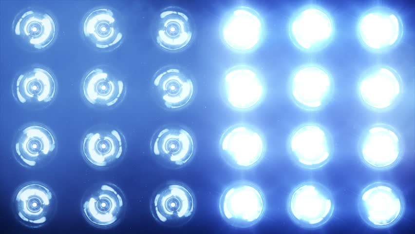 Stage lights. Close-up. Floodlights shining brightly and turning on and off. Blue. More color options in my portfolio.