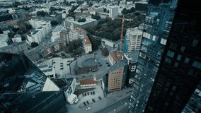 Aerial drone shot of glass skyscrapers. Shot in 4K (UHD). - Powered by Shutterstock - Get 15% off with code: PIKWIZARD15