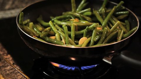 Chef Cooking Vegetables on Stove Stock Video