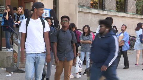 Toronto, Ontario, Canada September 2015 Diverse college and university students on campus on sunny summer day in Toronto