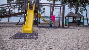 This wooden playground on a good location on the seaside offers a good place where children can playing, as we can see in a video.