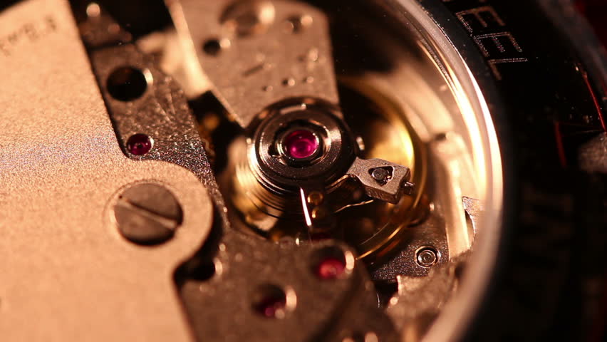Extreme close up of the inner workings and movement of a Swiss-made automatic