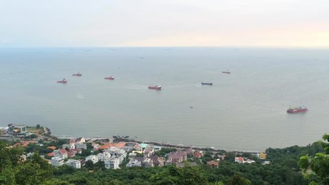 several ships and boats are at an anchor at the Vungtau city port, Vietnam 