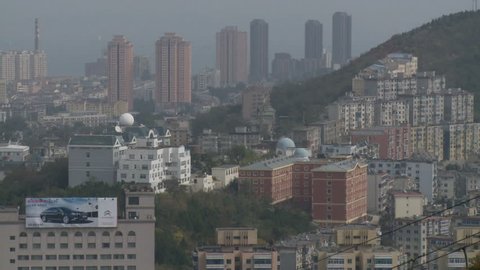 Dalian, China - October 2009: City view of Dalian, China, with modern office skyscrapers and apartment buildings