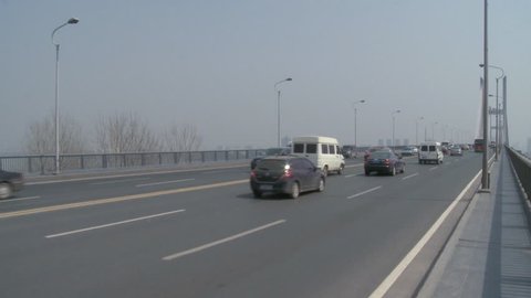 Wuhan, China - March 2010: Car traffic on Second Yangtze River Bridge in Wuhan, China.