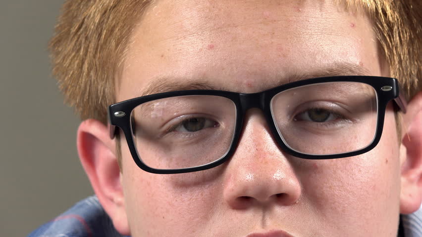 Boy with glasses slider shot of eyes 4k