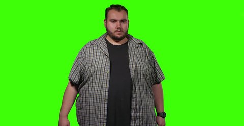Obese man having a heart attack isolated on green screen