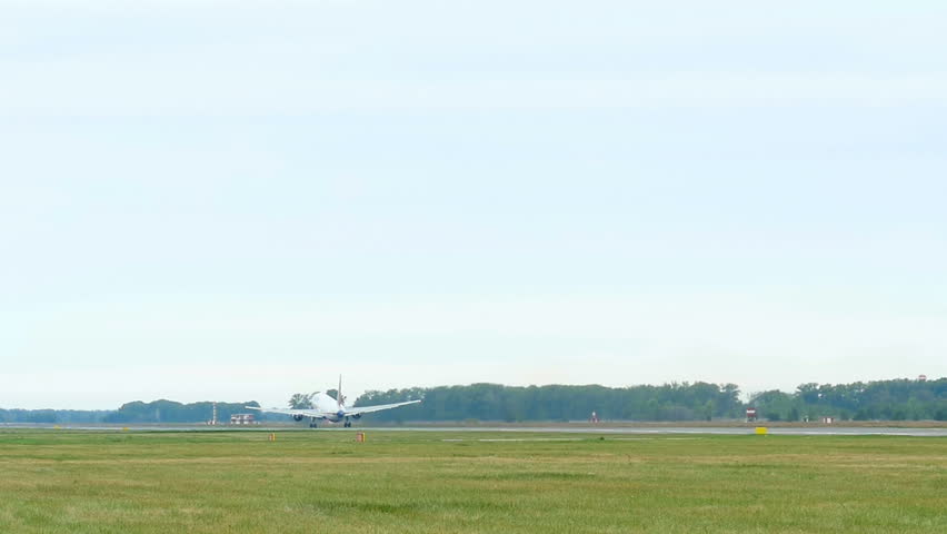 Boeing 767 take-off at Tolmachevo airport, Novosibirsk. Slow motion.