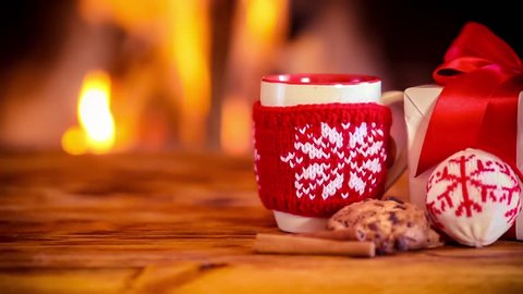 Christmas decorations against fireplace. Xmas holiday concept