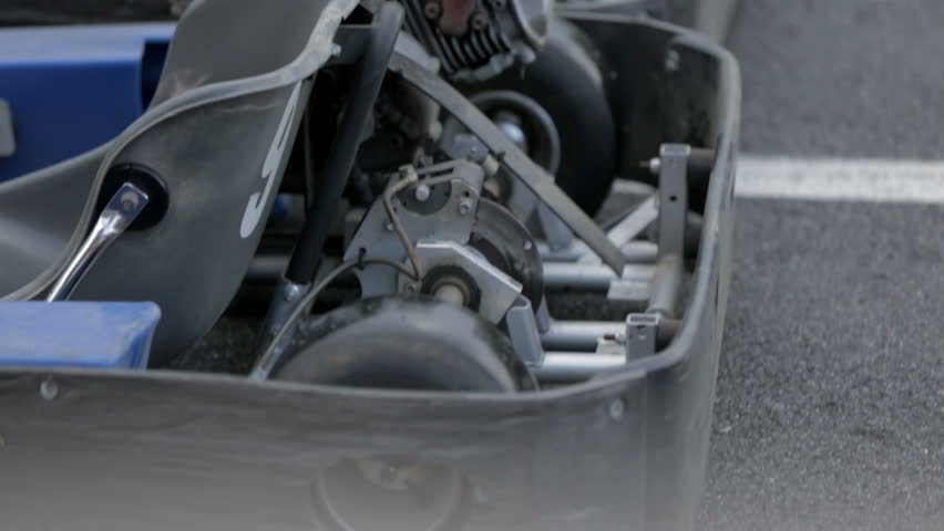 This is an air view on polygon with asphalt courses on a countryside which is used for car driving training.