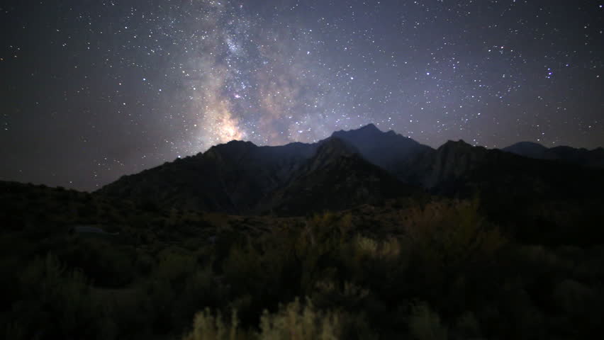 3 axis motion controlled astrophotography time lapse with dolly right, tilt up & pan right motion of milky way galaxy over Mt. Whitney in Sierra Nevada Mountains in California