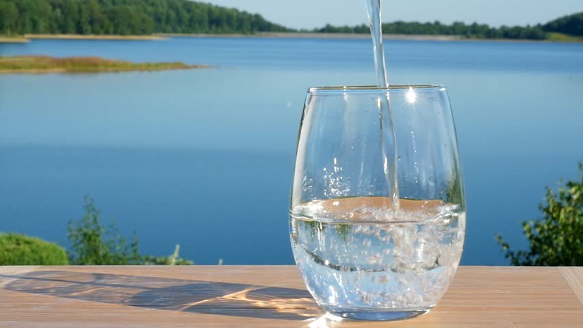 Water Pouring Into Glass Cup Stock Footage Video 100 Royalty Free Shutterstock