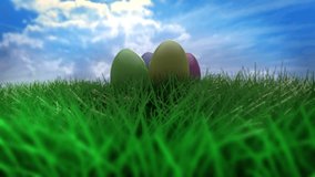 Easter Eggs Zoom. camera pushes in close to a set of four eggs in the grass. pink, yellow, green, purple 2 clips. 1st clip has 
