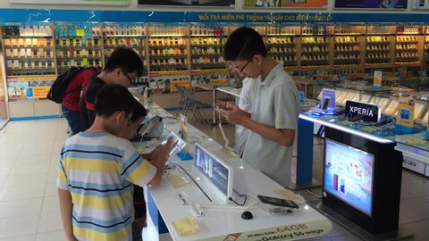 VUNG TAU, VIETNAM - AUGUST 12, 2015: Unidentified people buy electronic goods at the Dien May Xanh store. 