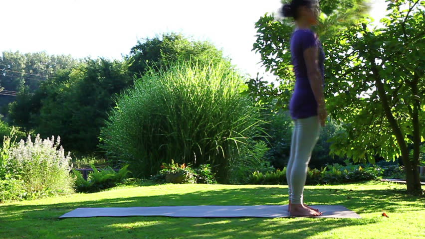 Woman is doing yoga in the garden - morph sequence