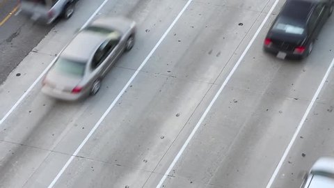 OVERHEAD SHOT OF CARS ON HIGHWAY, LOS ANGELES, CA 