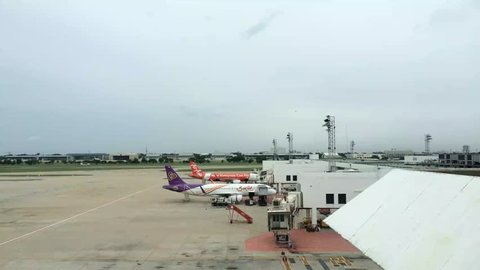 BANGKOK, THAILAND - SEPTEMBER 15 : ThaiAirasian Plane landed at Don Mueang International Airport on September 15,2015 in Bangkok,Thailand. ThaiAirasian is a major domestic low-cost airline in Thailand