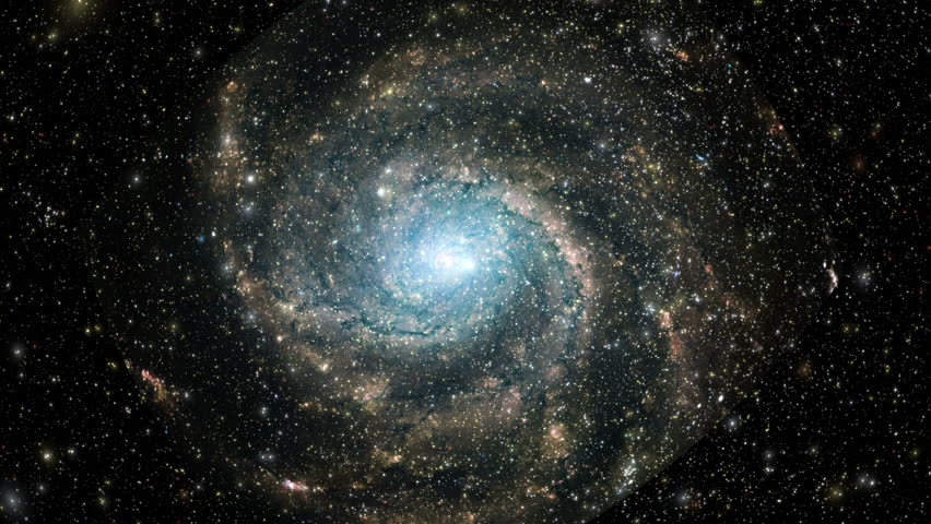 A large spiral galaxy speeds toward the camera as stars fly past. Royalty-Free Stock Footage #11858513