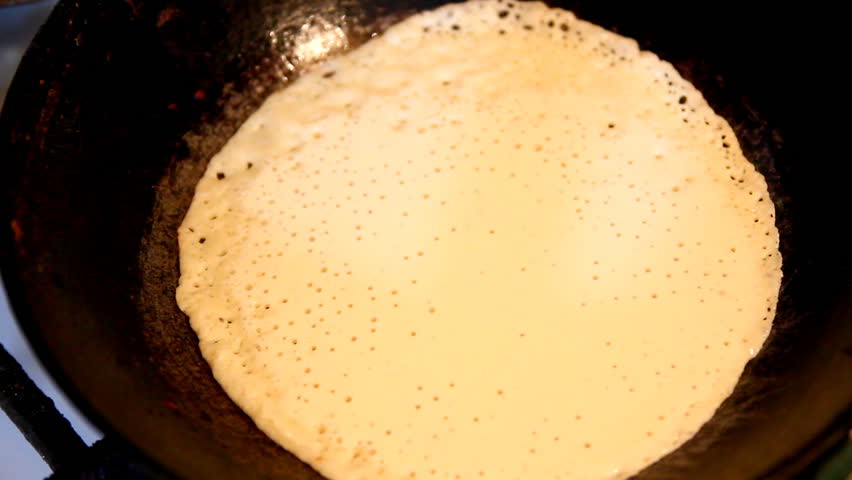 baking pancakes in a frying pan - timelapse