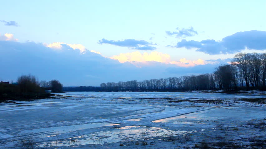 spring lake landscape with melting ice