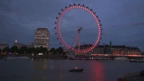 UNITED KINGDOM, LONDON, AUGUST 2015: Twilight London Eye Ferris Wheel Iron Construction Touristic  Entertainment 