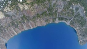 Aerial video of Crater Lake National Park in Oregon.