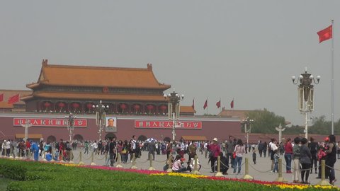 BEIJING, CHINA - APRIL 25, 2012, Tourist people enjoy Tiananmen Square and take photo by day