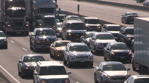 Pickering, Ontario, Canada September 2015 
Smog and rush hour traffic jam along the 401 in Ontario GTA