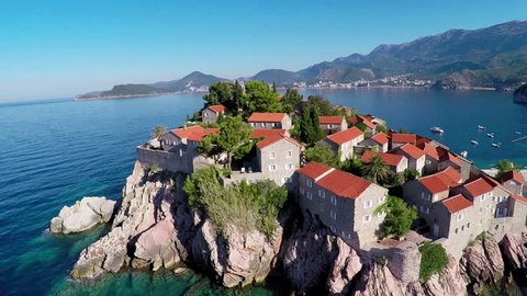 Flying over the island of Sveti Stefan, Montenegro, the Balkans - aerial photography