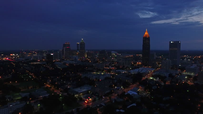 Aerial video of Atlanta Georgia at night. Sunset, thunderstorm.