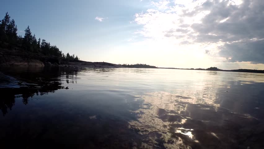 Ladoga lake. Water as a mirror. Very weak waves.