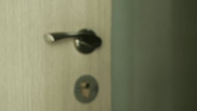 Close-up view of Man Hand Closes the Door. 4K Ultra HD 3840x2160 Video Clip