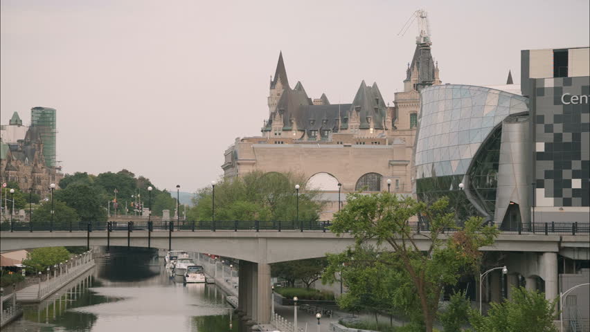 Panoramic View of Ottawa Canal in an early summer morning with Chateau Laurier and Parliament Hill in the background