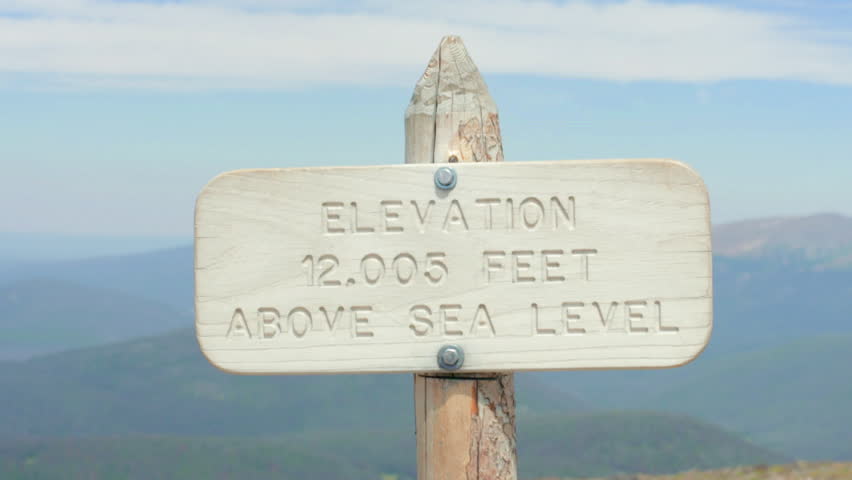 Elevation 12,005 Feet Above Sea Level Sign in The Rocky Mountains of Colorado