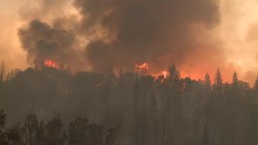FOREST FIRES OF NORTHERN CALIFORNIA SUMMER 2015 WILD FIRES SMOKE FLAMES FIREFIGHTER CREWS BATTLE THE FIRES DURING THE DRY DROUGHT CONDITIONS HD HIGH DEFINITION STOCK VIDEO FOOTAGE CLIP 1920X1080